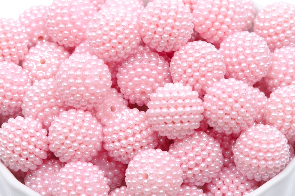 pink bubblegum beads on a white background