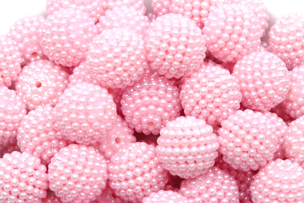 pink bubblegum beads on a white background 