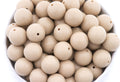 brown beads in a white bowl on a white background