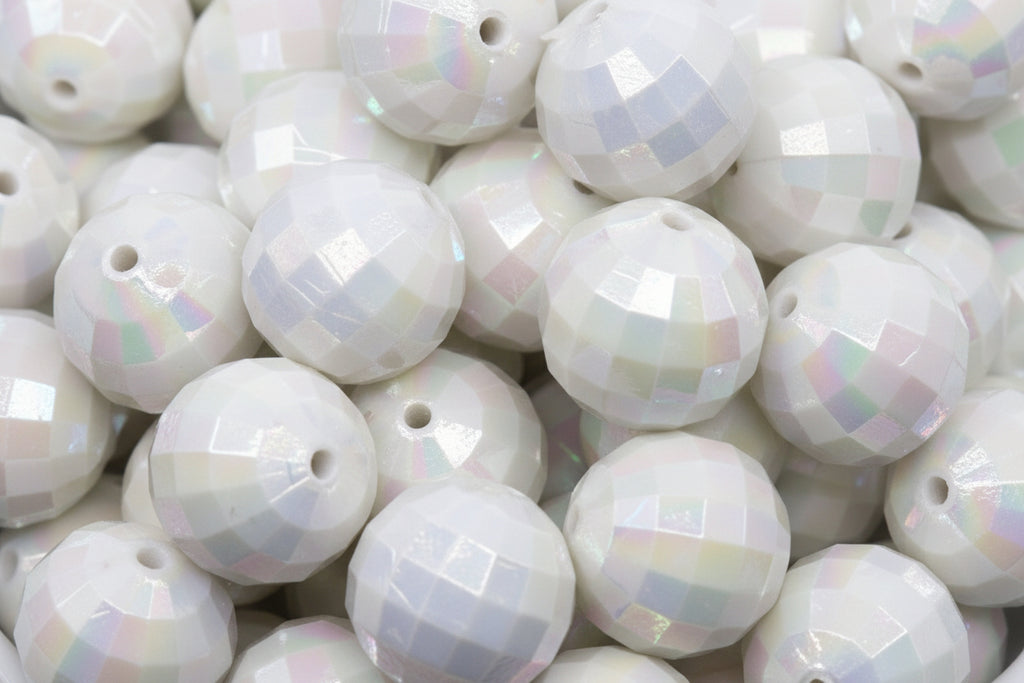 white faceted beads in a white bowl