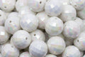 white faceted beads in a white bowl