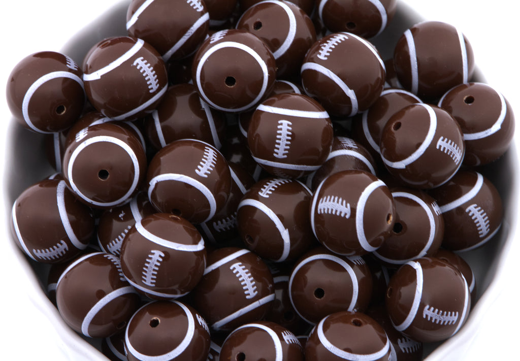 Football beads in a white bowl on a white background 