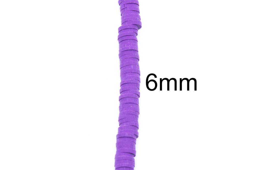 A close-up of a purple polymer clay disc bead strand , with the text '6mm' printed beside it on a plain white background.