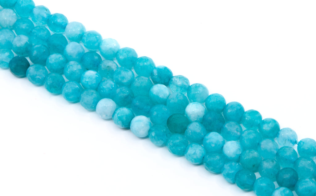 four strands of round blue faceted agate  beads, arranged diagonally on a plain white background.