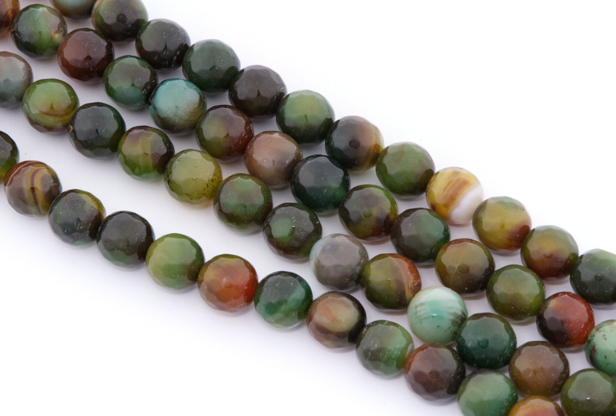 Four strands of polished round faceted agate beads on a white background. The beads feature natural banding with colors of green, brown, orange, and dark gray.