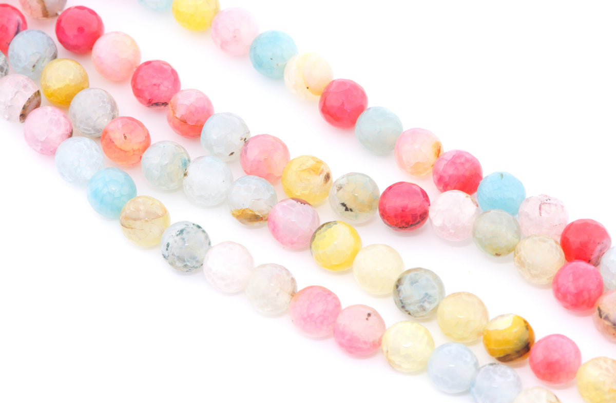 Multicolor round faceted agate beads in pink, yellow, blue, white, and gray, arranged in diagonal rows on a white background.