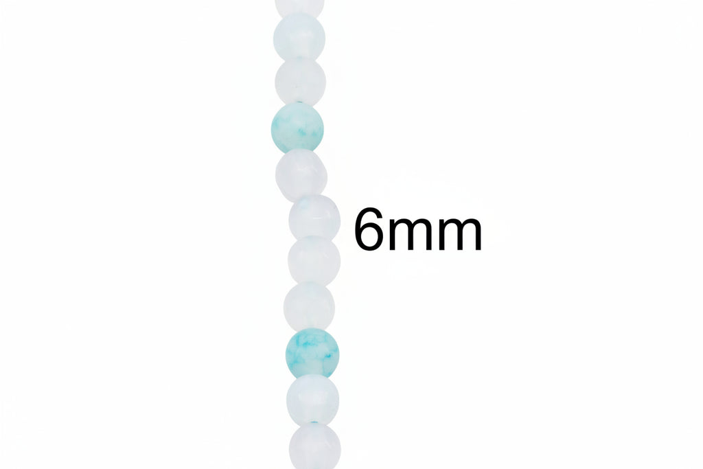 A close-up of a beaded strand with mostly gray round beads and a few light blue marbled beads, shown against a pale gray background with the text '6mm' indicating bead size.
