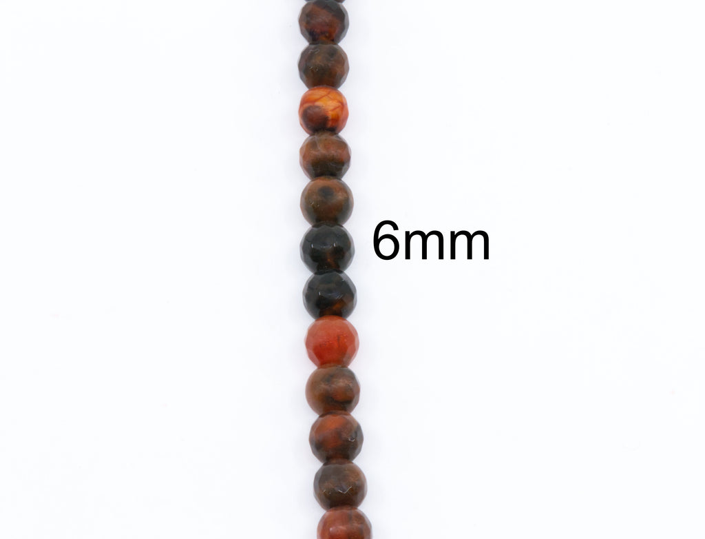 A vertical strand of round polished faceted agate beads in orange and black, shown on a plain white background with the text '6mm' overlaid to indicate bead size.