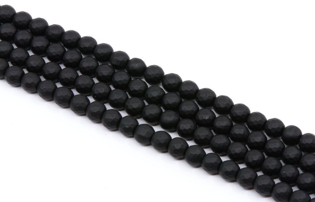 Faceted black round agate beads arranged in four parallel strands on a plain white background.