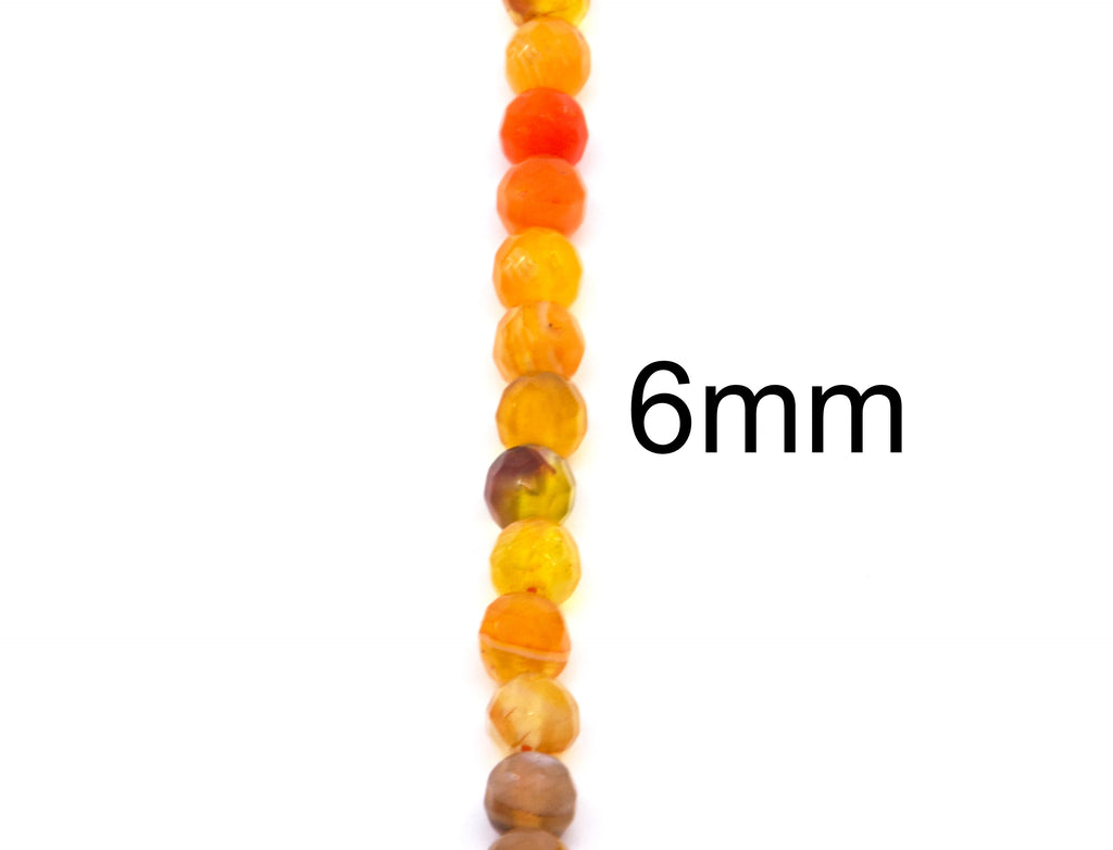A single strand of round, polished faceted agate beads in warm amber, orange, and yellow tones, shown vertically on a white background with '6mm' text indicating the bead size.