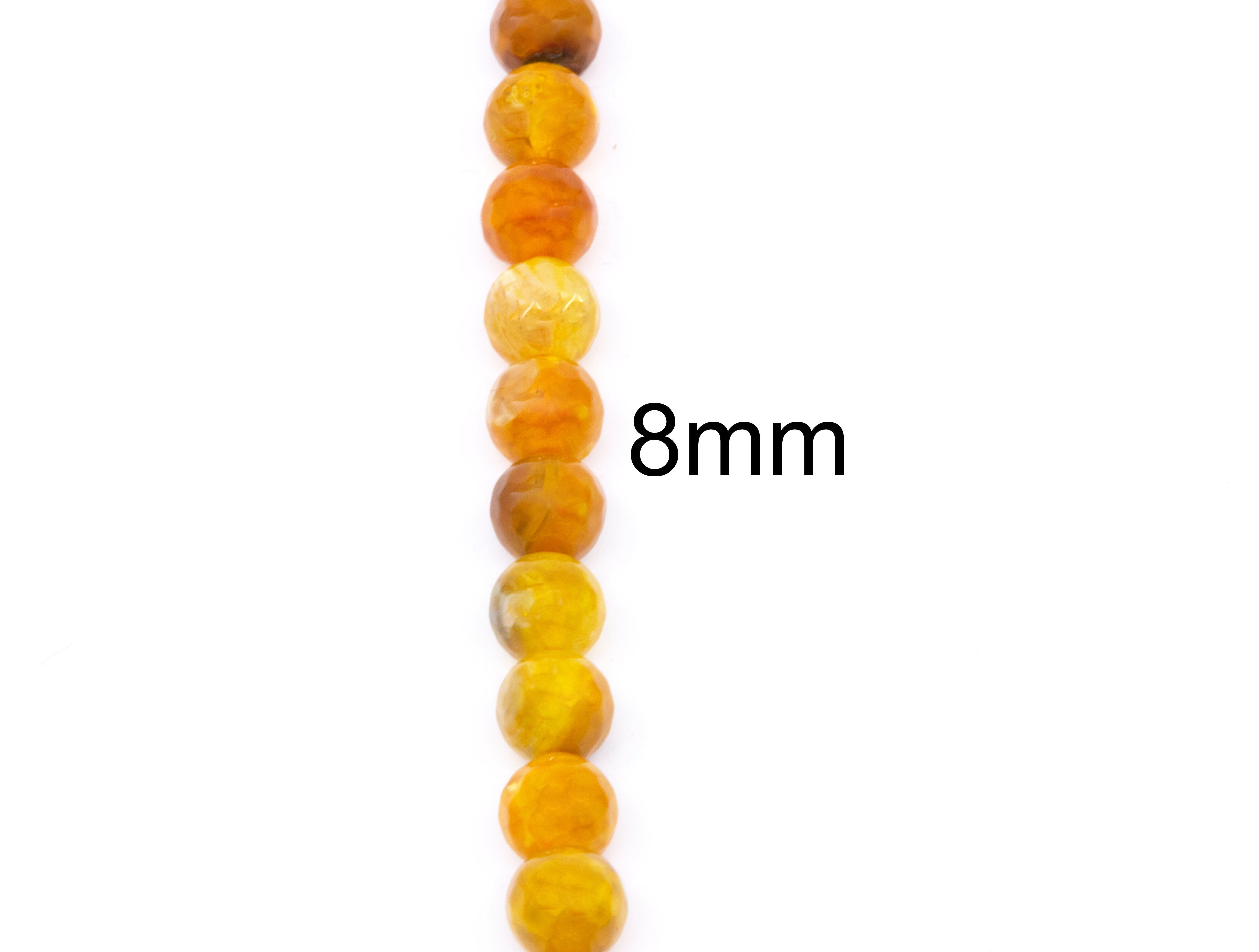 A vertical strand of faceted round beads in warm amber, orange, and yellow tones on a plain white background, with the text '8mm' printed beside them.