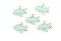 Five small airplane-shaped charms in light blue enamel with gold-tone metal outlines and loops, arranged on a plain white background.