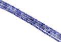 four strands of blue aventurine beads arranged diagonally on a white background.