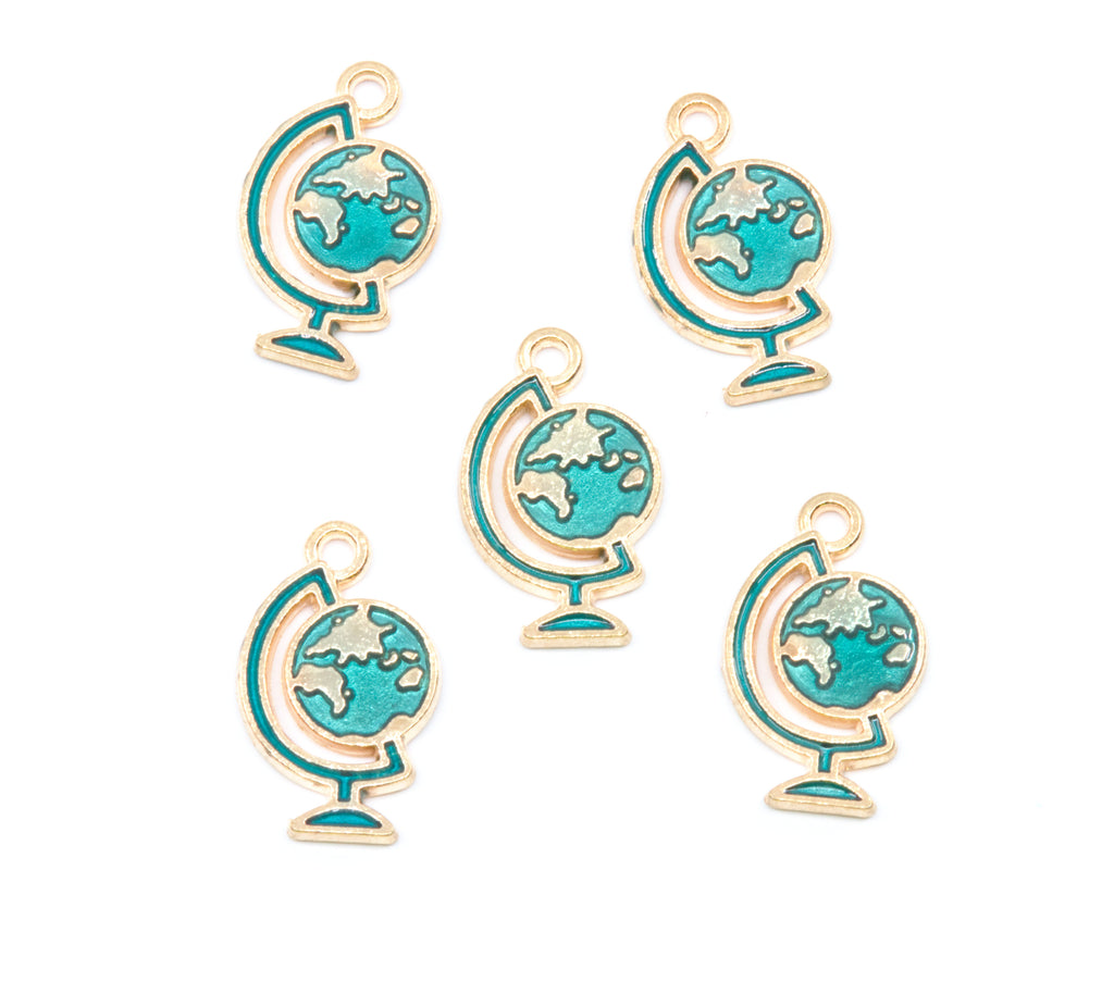 Five globe-shaped jewelry charms with blue enamel and gold-tone metal borders, arranged on a plain white background.