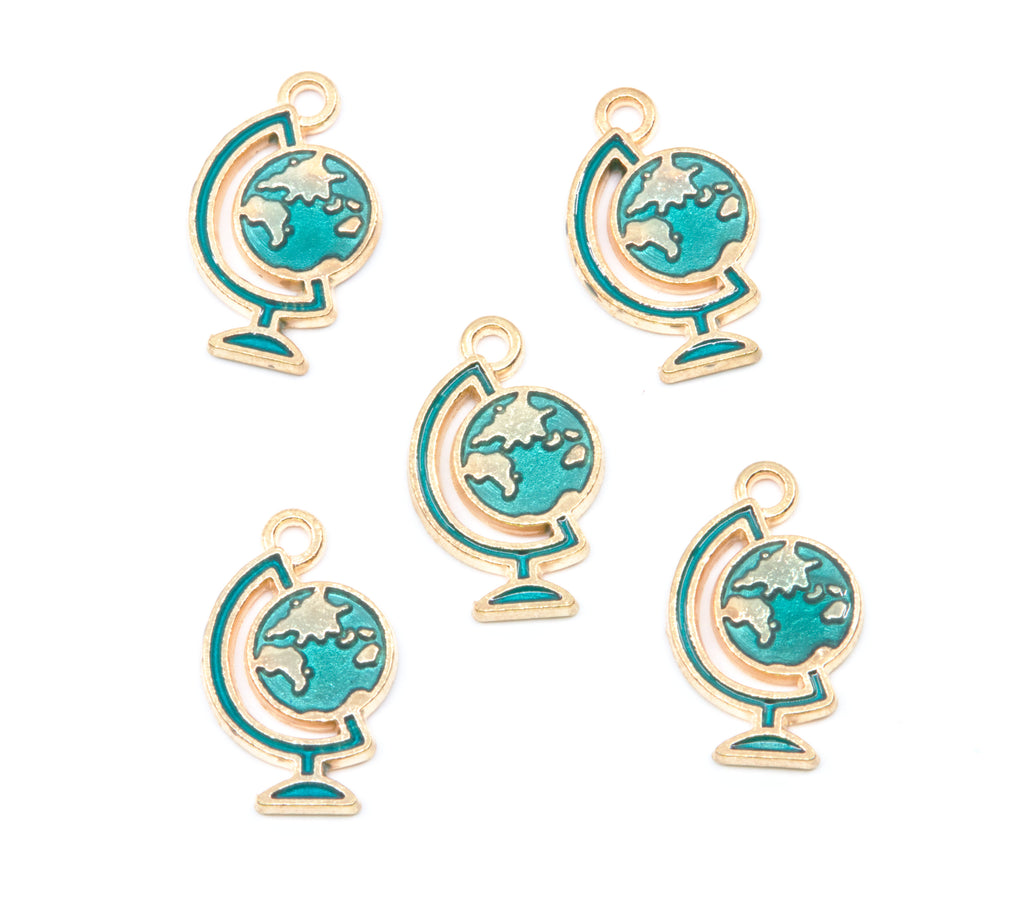 Five globe-shaped jewelry charms with blue enamel and gold-tone metal borders, arranged on a plain white background.