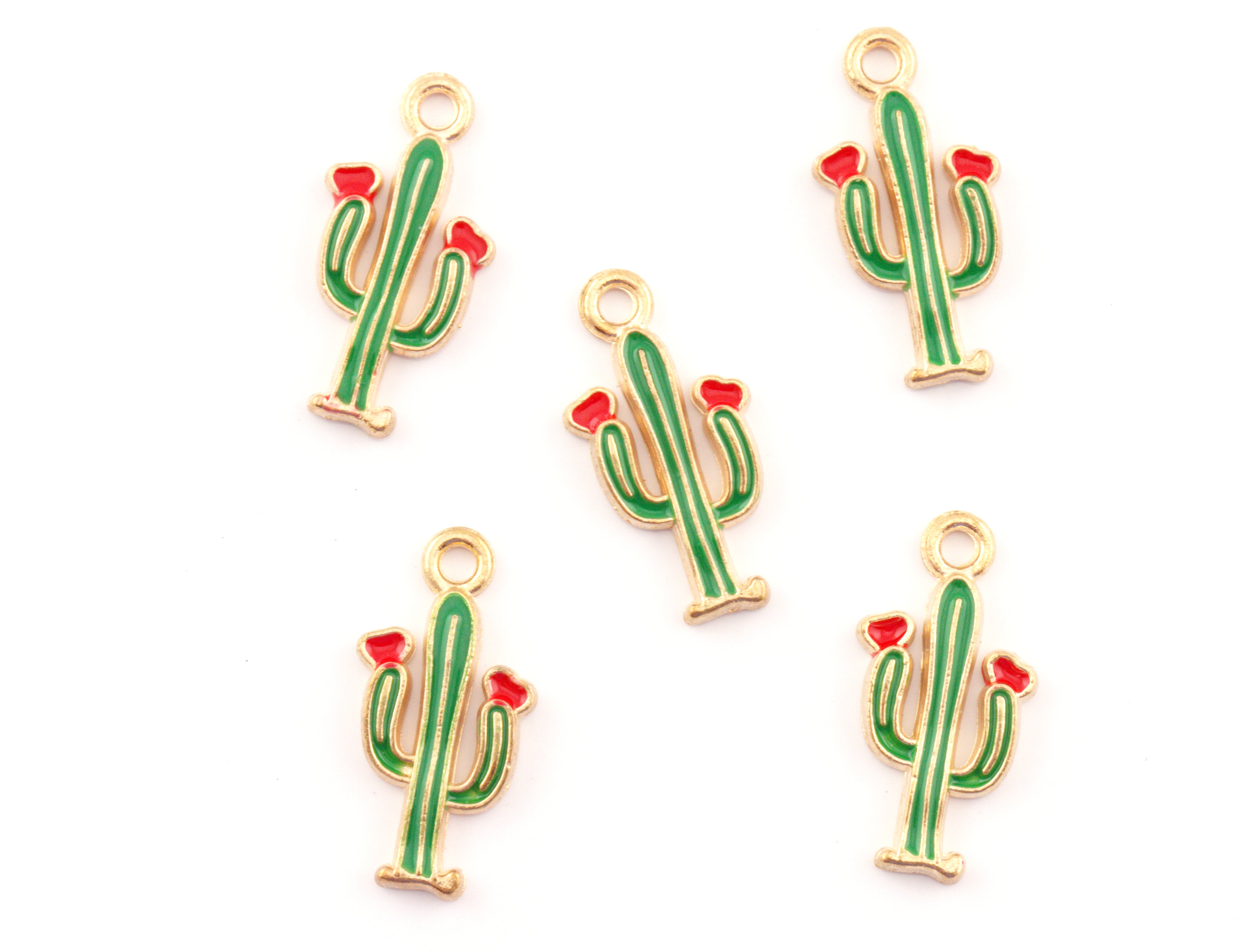 Five small cactus charms with green bodies, red flowers, and gold-tone outlines on a plain white background.