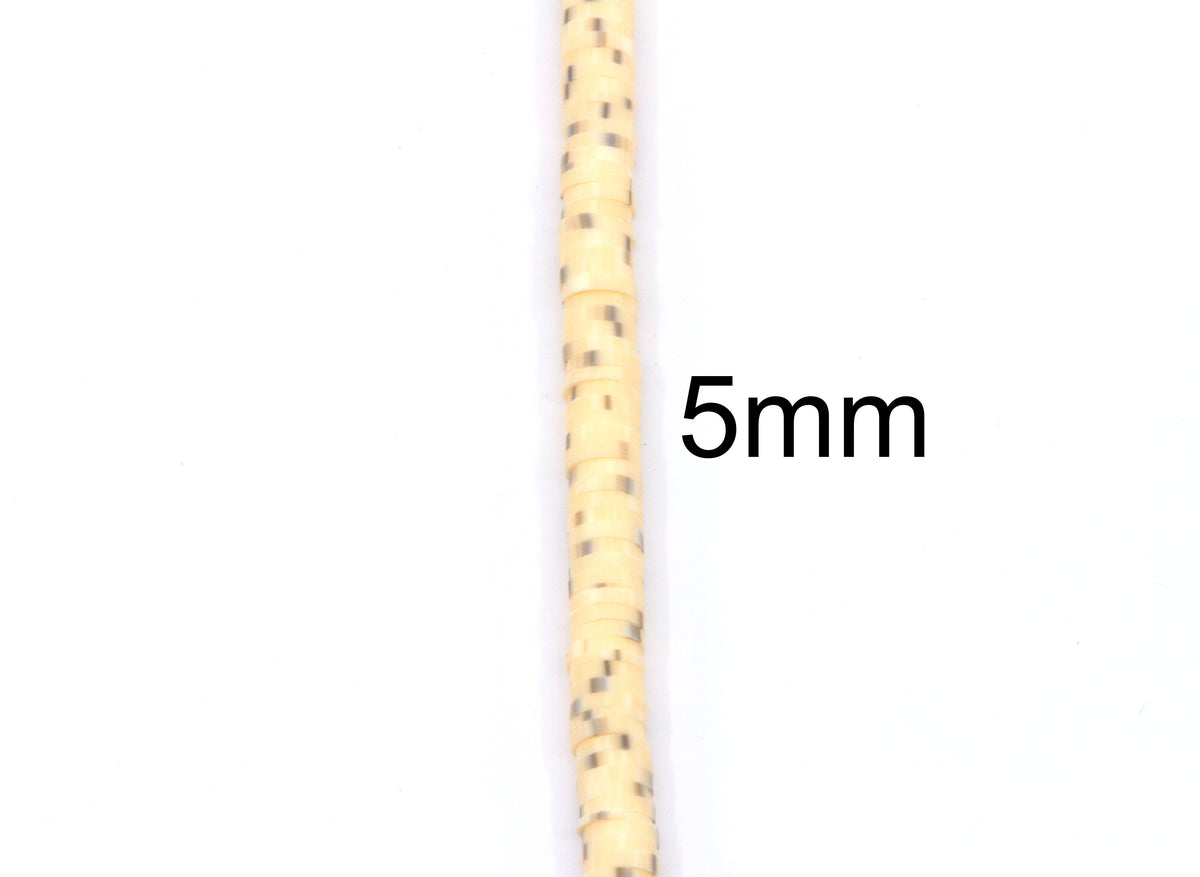 A close-up of a single strand of light orange polymer clay disc beads shown vertically on a white background with the text '5mm' indicating its size