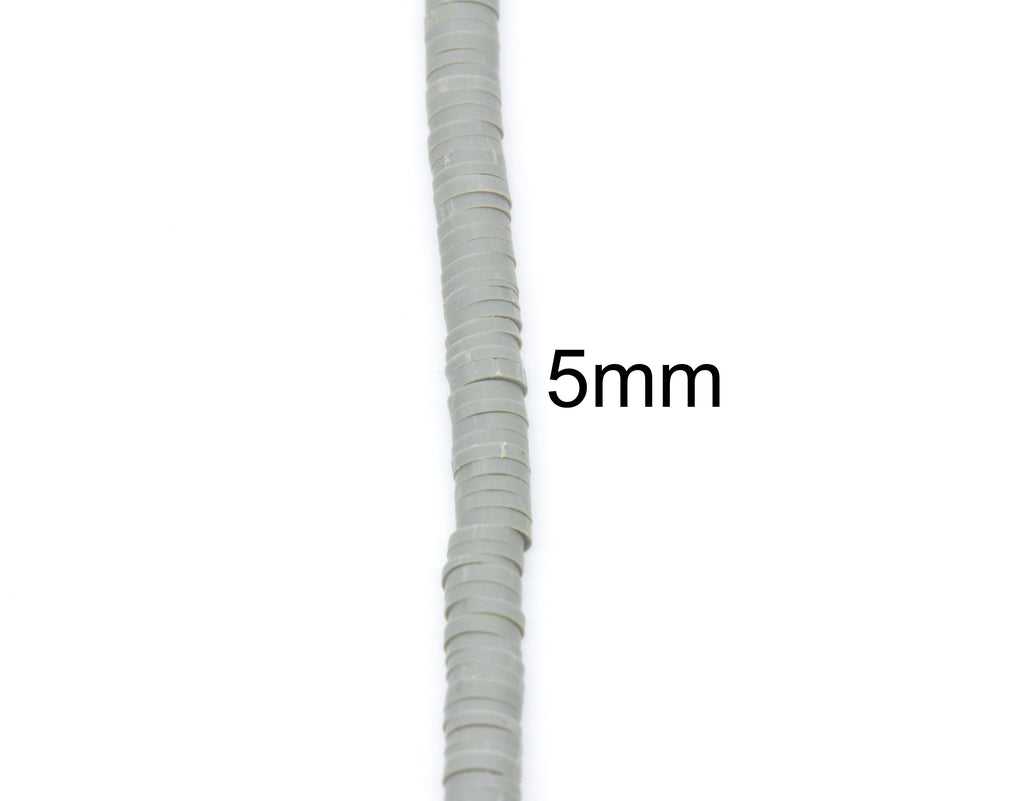 A close-up of a single strand of gray polymer clay disc beads shown vertically on a white background, with the text '5mm' indicating the size