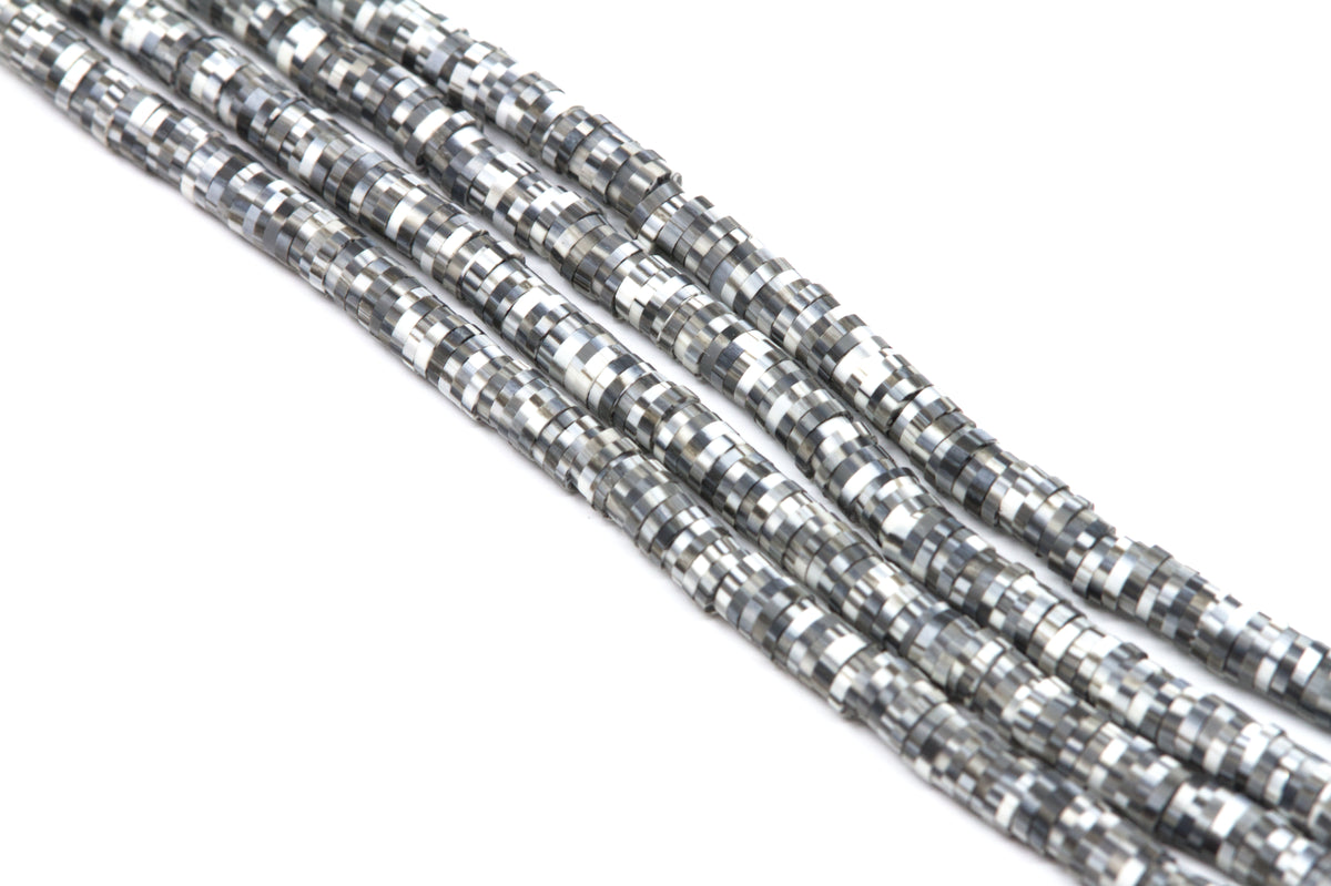 Several strands of white and gray polymer clay disc beads, arranged diagonally on a white background.