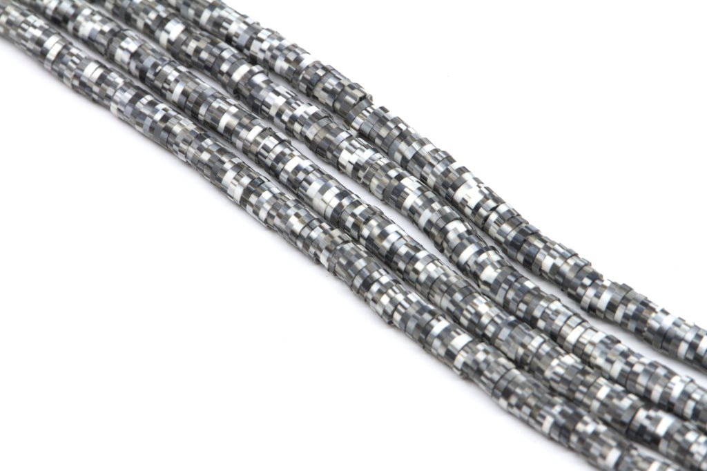 Several strands of white and gray polymer clay disc beads, arranged diagonally on a white background.