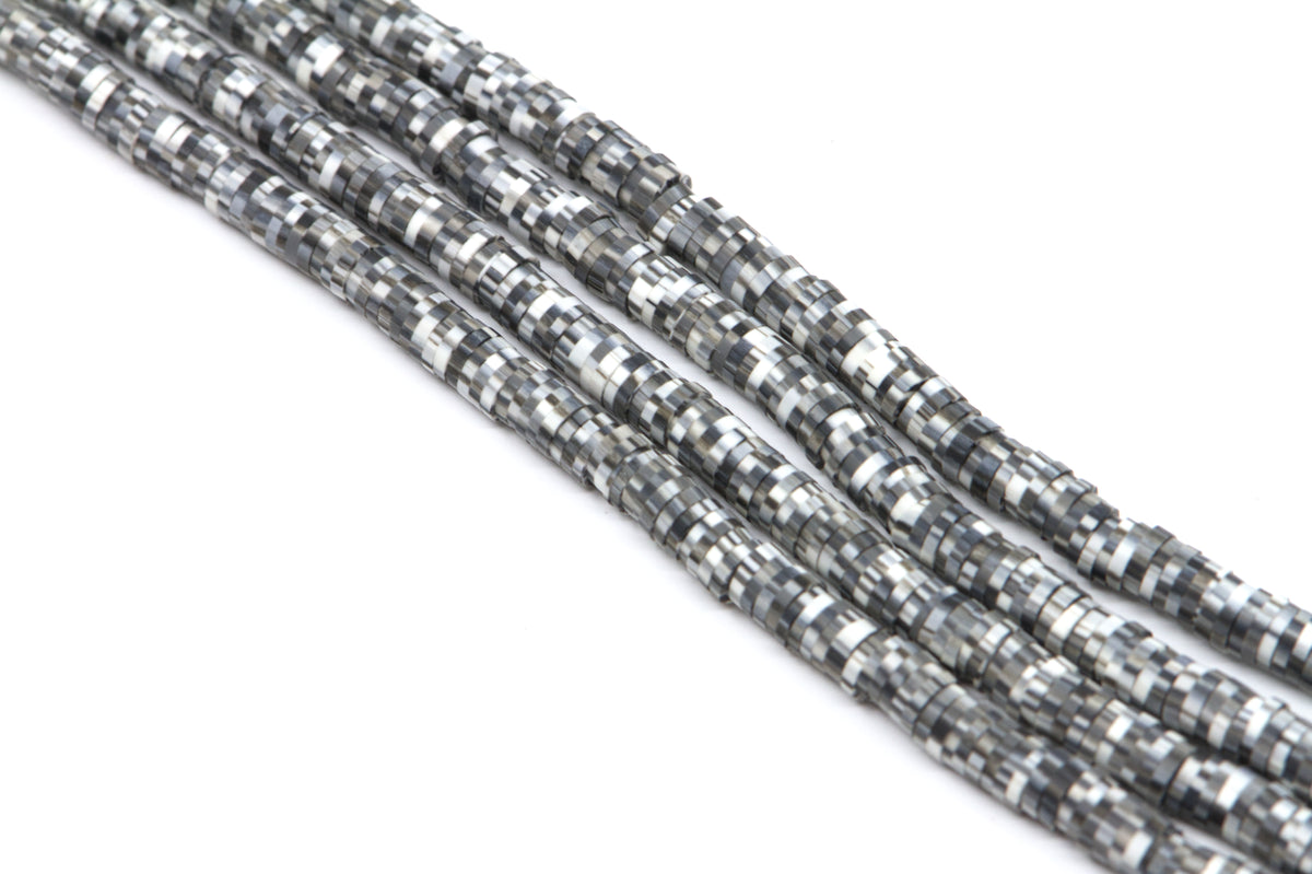 Several strands of white and gray polymer clay disc beads, arranged diagonally on a white background.