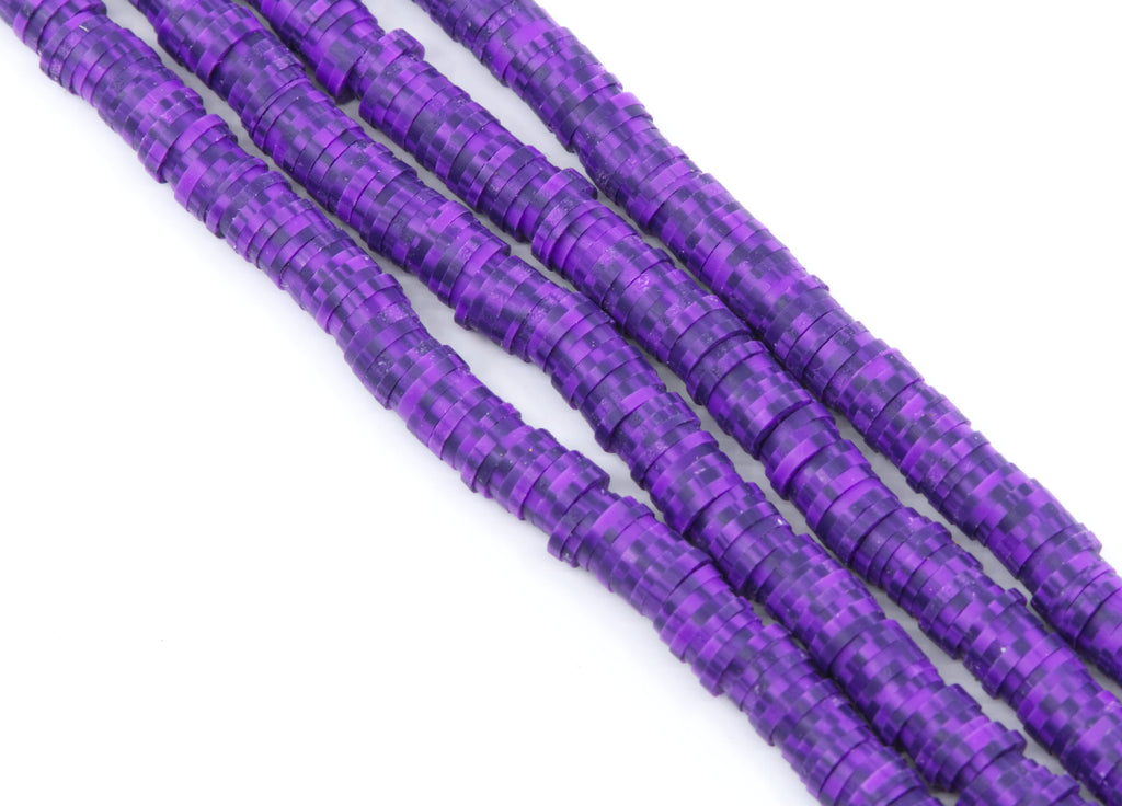 four strands of dark speckled purple polymer clay disc beads on a white background.