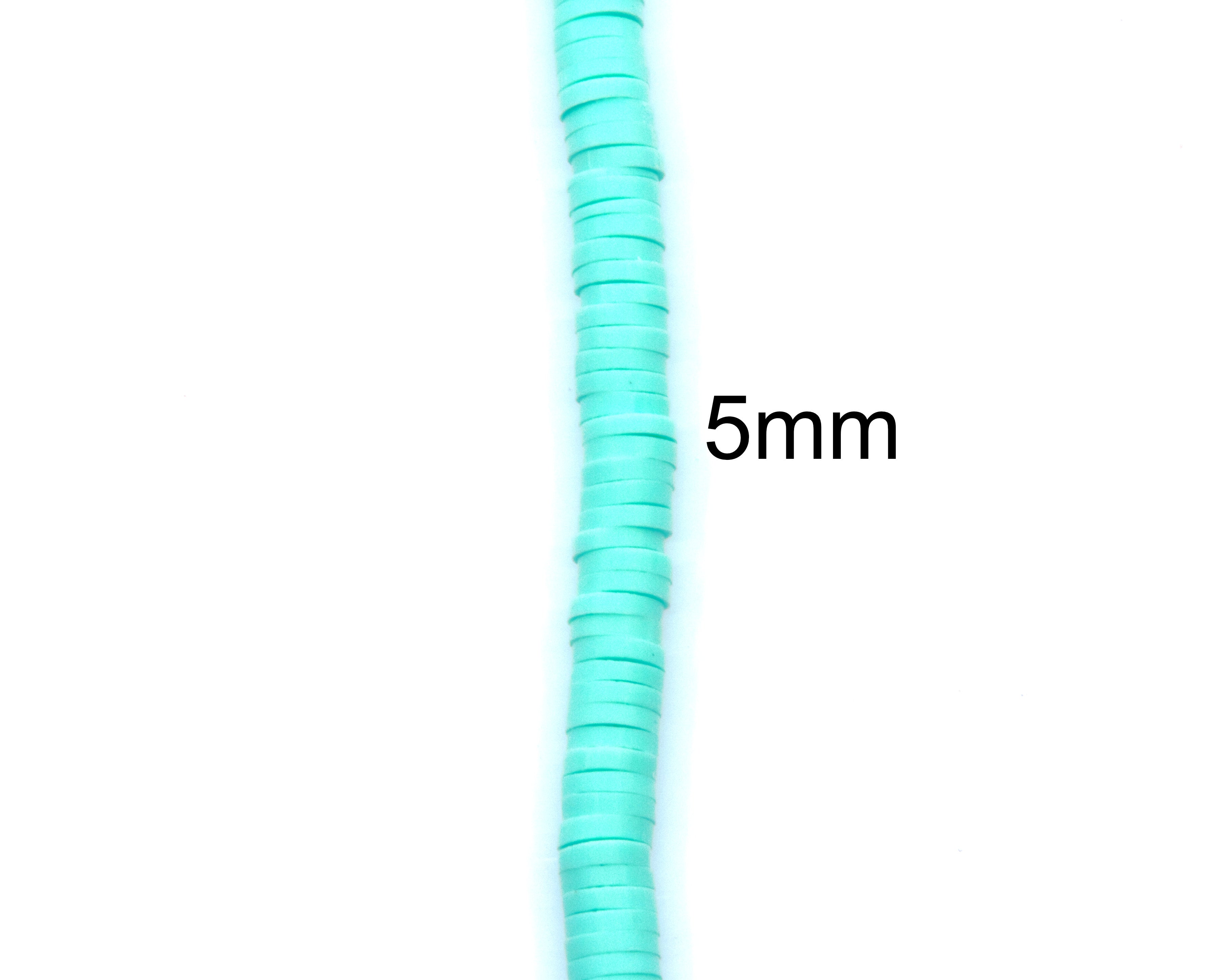 A close-up vertical view of a single strand of blue polymer clay disc beads with a black text overlay reading '5mm' indicating size on a plain white background.