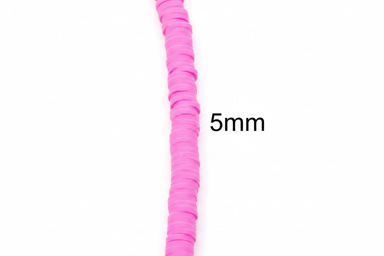 A close-up of a bright pink strand of polymer clay disc beads shown vertically on a plain light gray background, with the text '5mm' overlaid to indicate size