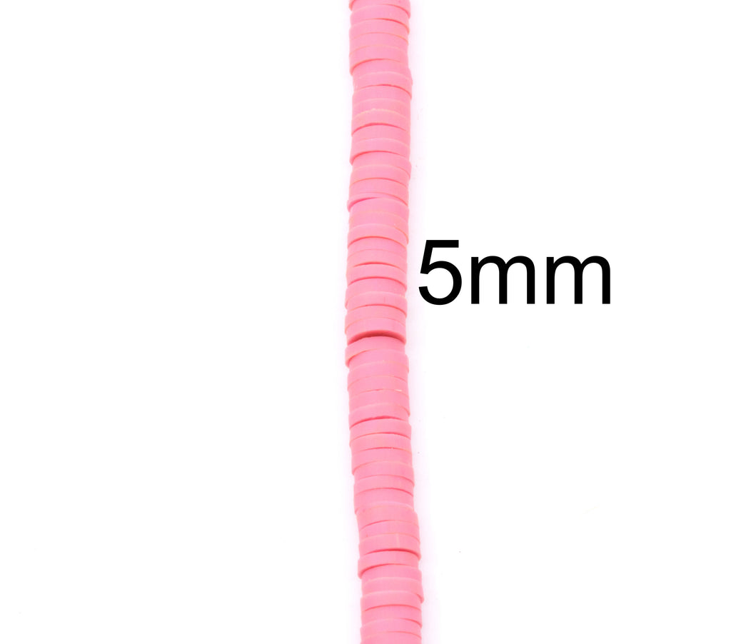 A close-up vertical strand of pink polymer clay disc beads with black text reading '5mm' to indicate size on a plain white background.