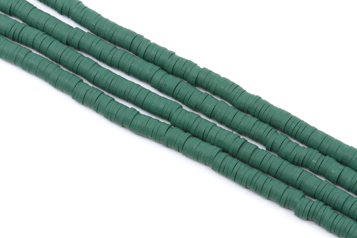 Four strands of dark green polymer clay disc beads arranged diagonally on a plain white background.