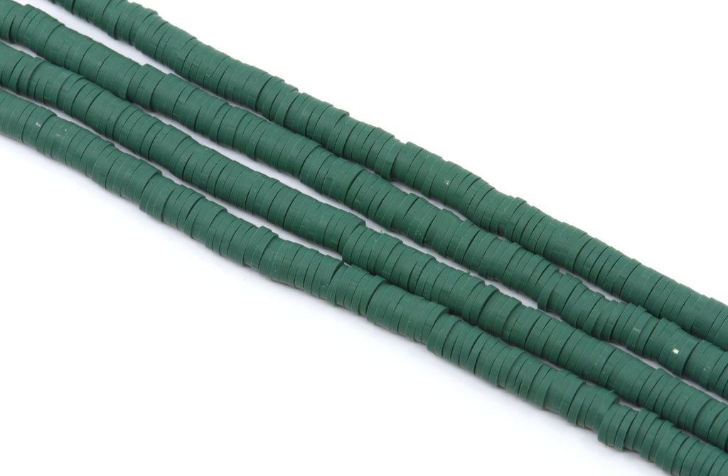 Four strands of dark green polymer clay disc beads arranged diagonally on a plain white background.