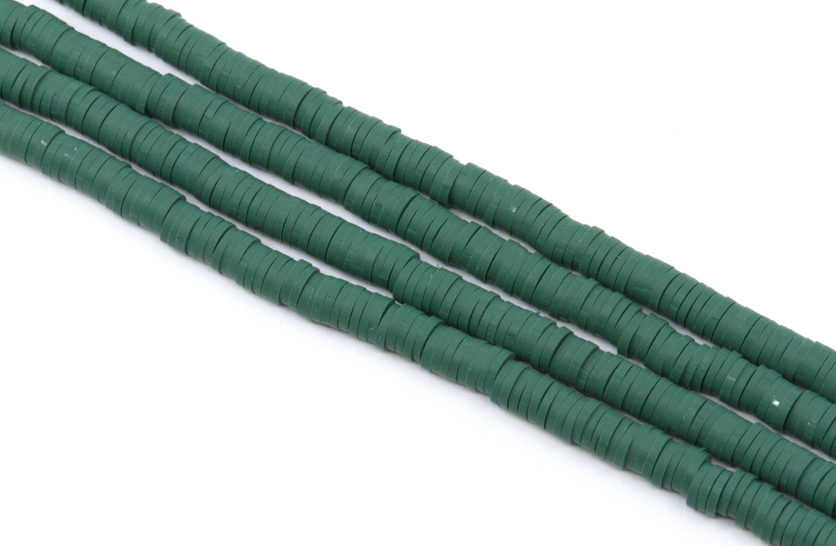 Four strands of dark green polymer clay disc beads arranged diagonally on a plain white background.
