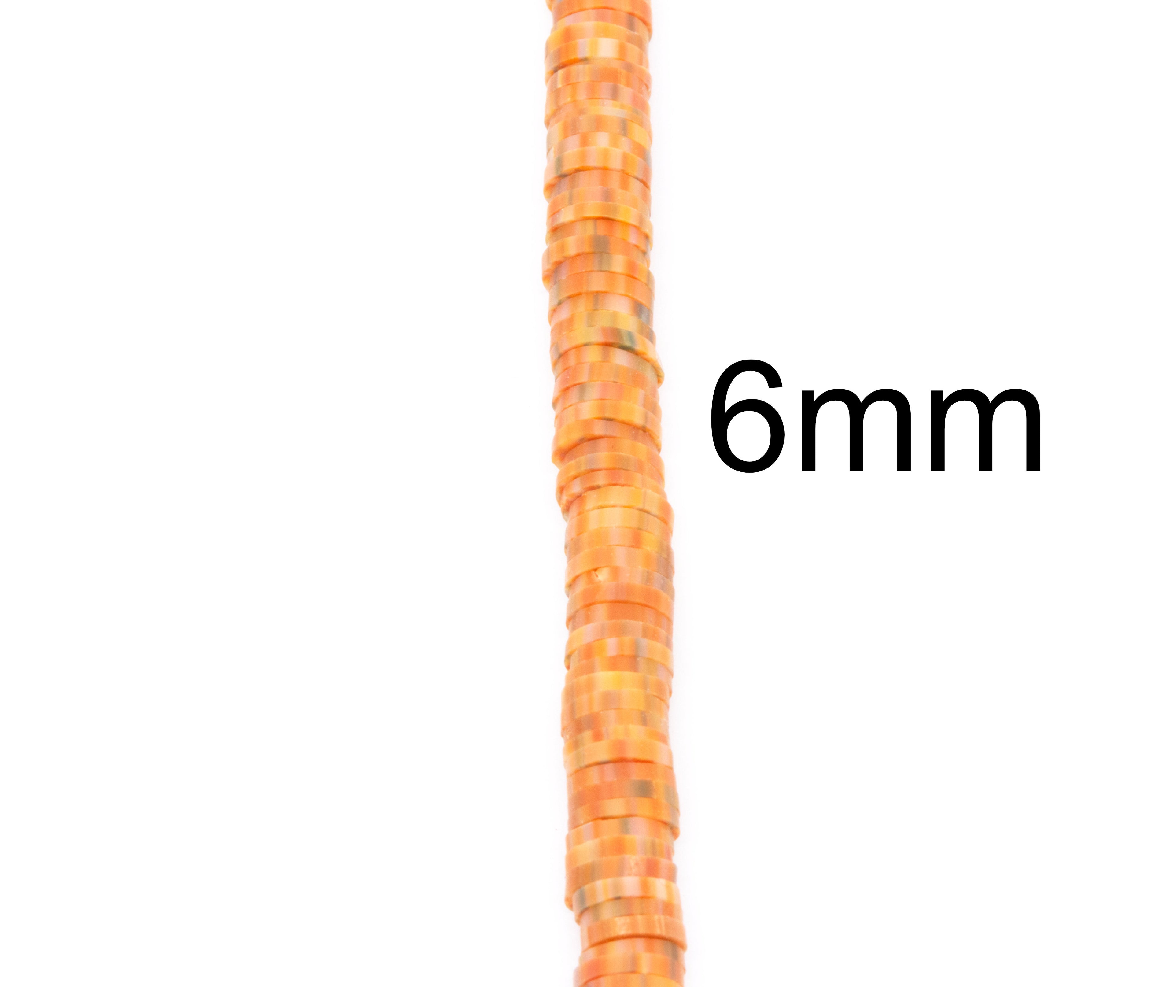 String of orange beads with a 6mm measurement label on a white background