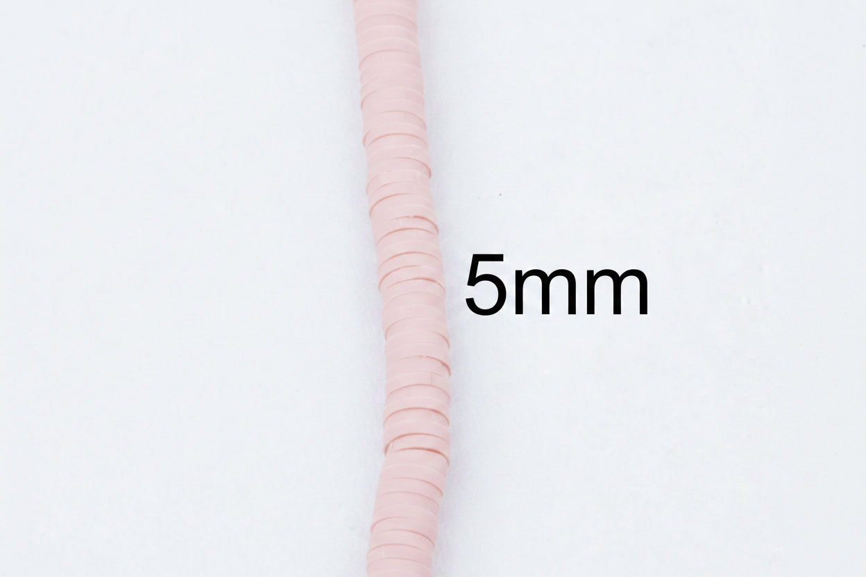 A close-up of a single strand of  pink polymer clay beads placed vertically on a white background, with the text '5mm' overlaid to indicate size.