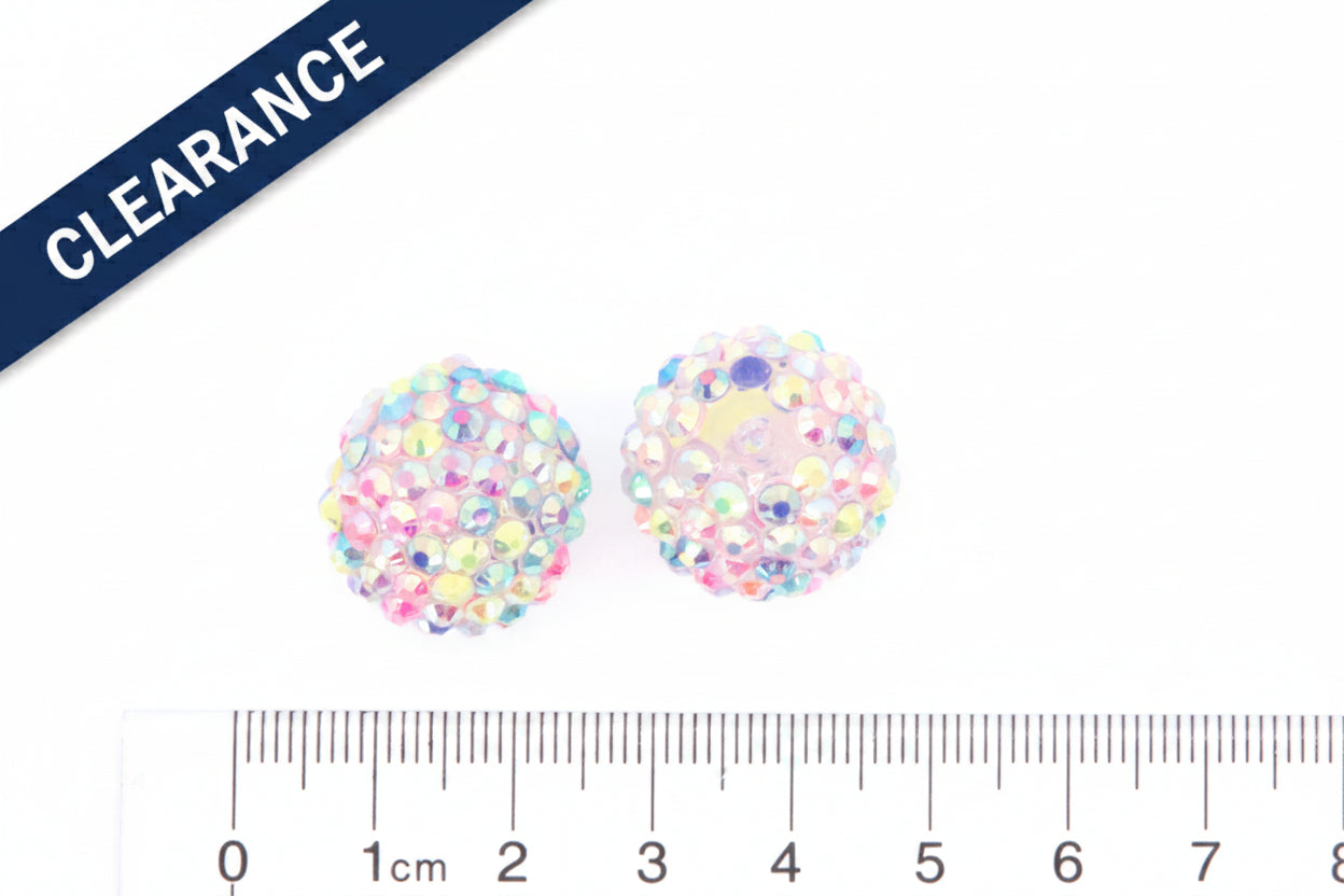 pastel rainbow rhinestone beads with a ruler for scale on a white background with a clearance banner