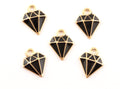 Five black and gold diamond-shaped jewelry charms with cutout facets, arranged on a plain white background.