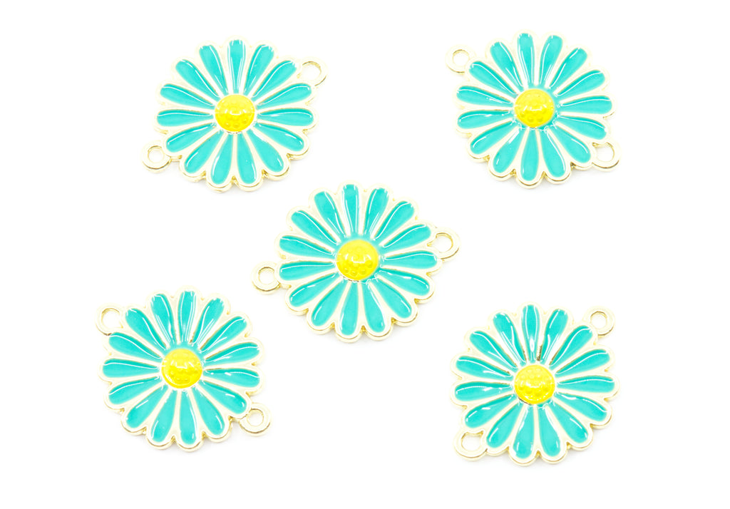 Five blue and yellow enamel daisy flower charms with gold-tone metal borders and small hanging loops, arranged on a plain white background.