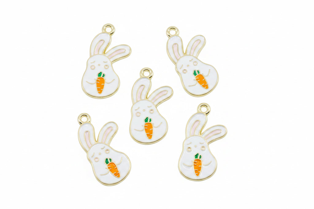 Five white bunny charms with gold-tone edges, holding small orange carrots with green tops, arranged on a white background.