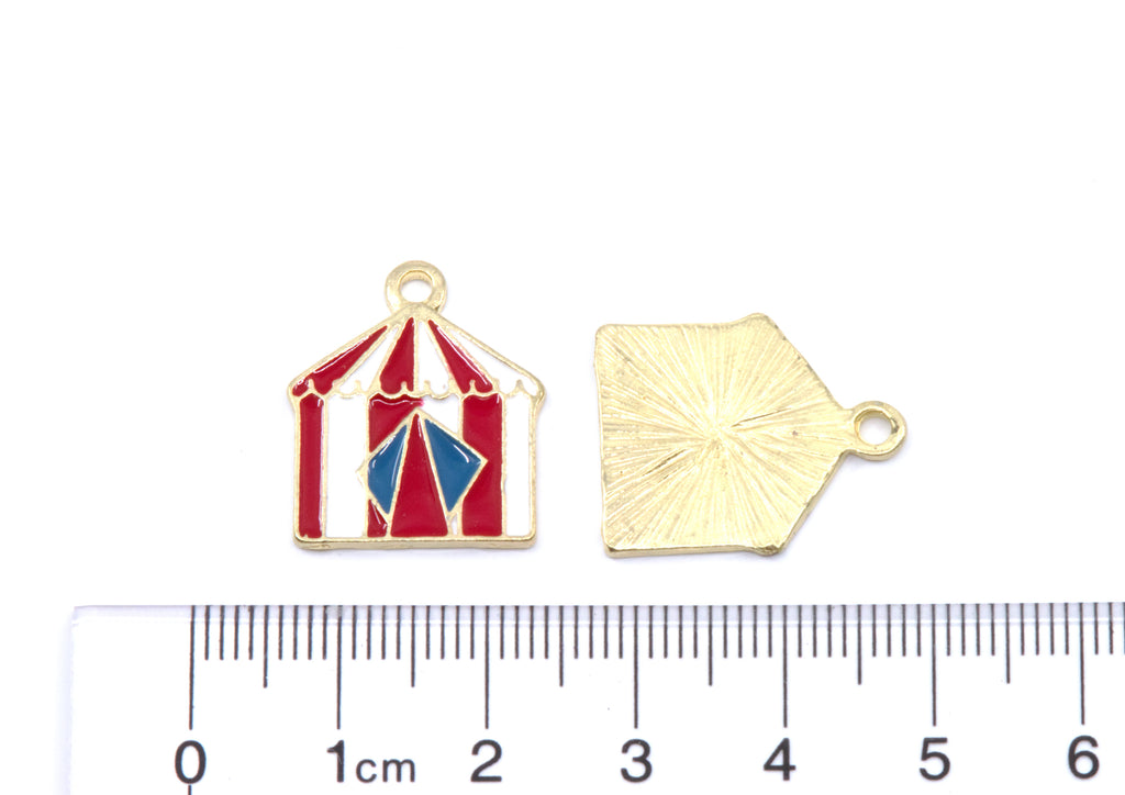 Two red and white circus tent  jewelry charms shown on a white background with a 1 cm ruler below for scale. 