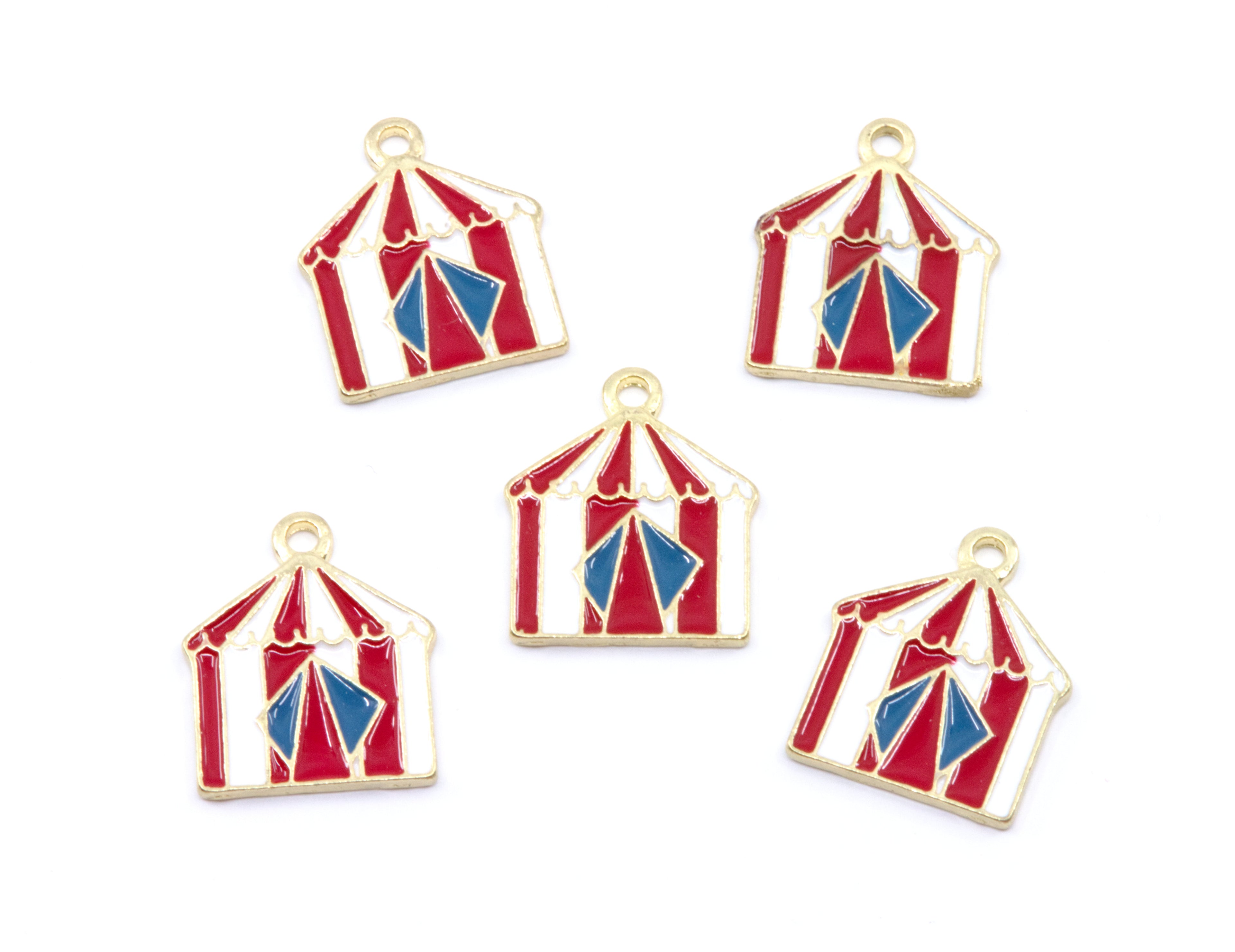 Five small circus tent charms with red and white stripes, blue center panels, and gold-tone metal edges, arranged on a plain white background.