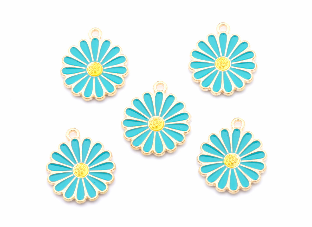 Five blue and gold daisy flower charms with small hanging loops, arranged on a plain white background.