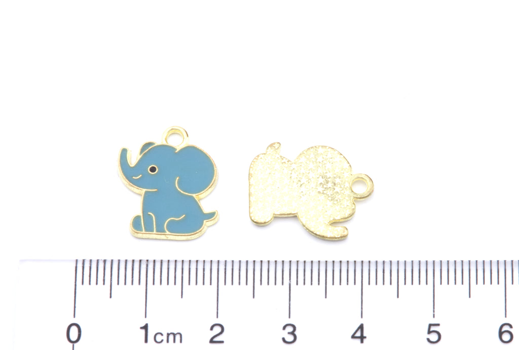 Two small elephant-shaped jewelry charms shown on a white background above a ruler for scale. 