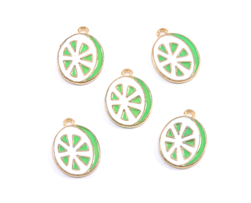 Five enamel charms shaped like lime slices, featuring a gold-tone metal border, white center, and bright green outer ring, arranged on a plain white background.