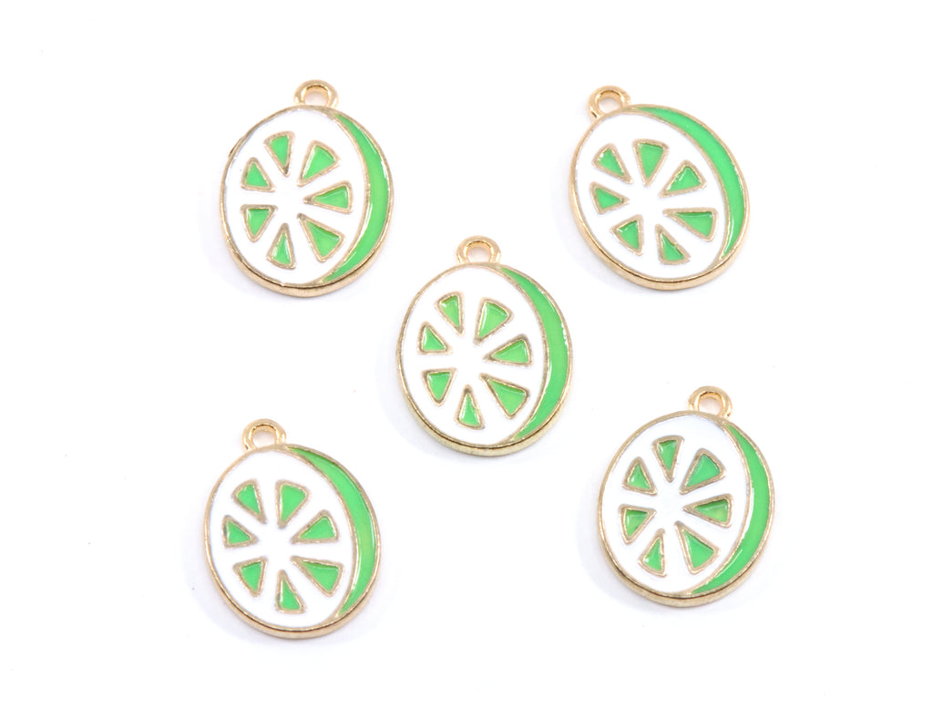 Five enamel charms shaped like lime slices, featuring a gold-tone metal border, white center, and bright green outer ring, arranged on a plain white background.
