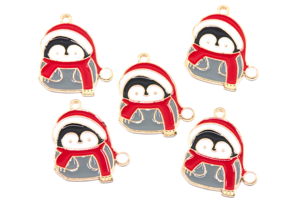 Five identical penguin charms wearing Santa hats and scarves, arranged on a plain white background. Each charm has a gold-tone outline with red, white, black, and gray enamel details and a small loop at the top.
