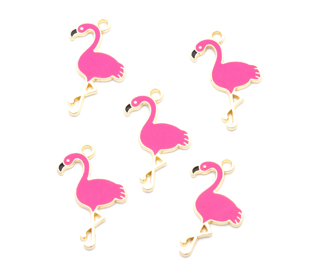 Five pink flamingo charms with gold-tone metal borders and loops, arranged on a plain white background.