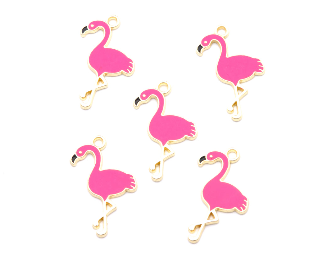 Five pink flamingo charms with gold-tone metal outlines and loops, arranged on a plain white background.
