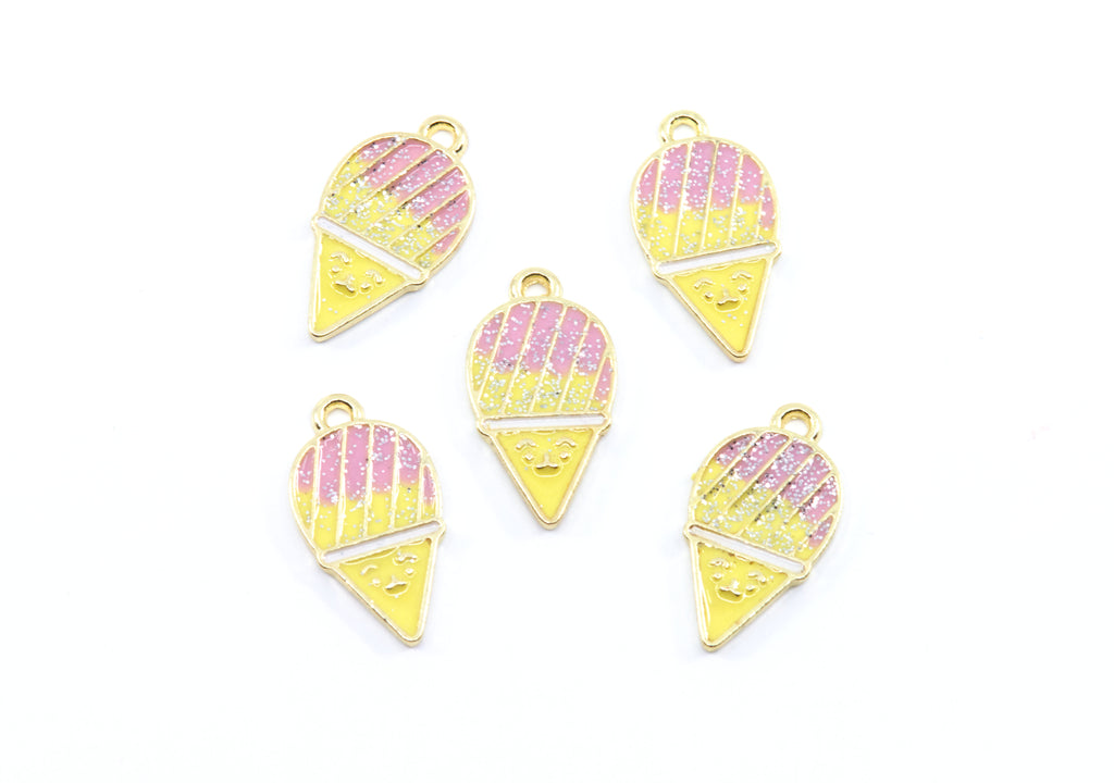 Five gold-plated snowcone charms with pink and yellow glitter enamel, arranged on a plain white background.