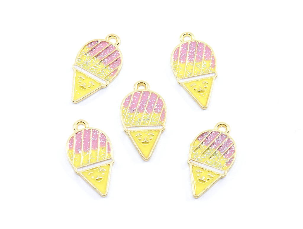 Five gold-plated snowcone charms with pink and yellow glitter enamel, arranged on a plain white background.