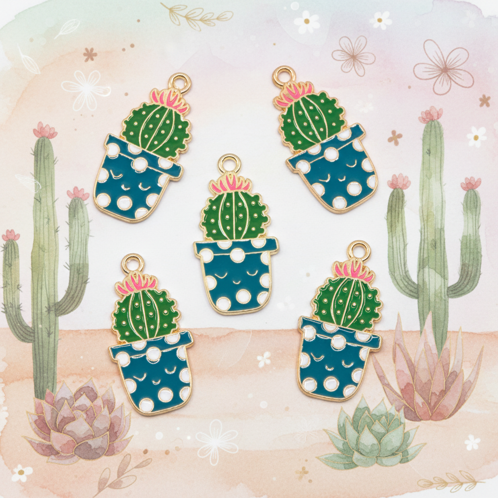 Five enamel cactus charms in pots with gold-tone edges, displayed on a pastel watercolor background with cacti and flowers.